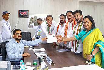 **EDS: IMAGE VIA @revanth_anumula POSTED ON WEDNESDAY, APRIL 24, 2024** Secunderabad: Congress candidate Danam Nagender files his nomination for Lok Sabha elections in the presence of Telangana Chief Minister A Revanth Reddy and party leader Mohammad Azharuddin, in Secunderabad district. (PTI Photo)(PTI04_24_2024_000076B)