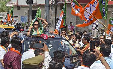Mathura: Actress and BJP candidate Hema Malini during a roadshow for Lok Sabha elections, in Mathura, Wednesday, April 24, 2024. (PTI Photo)(PTI04_24_2024_000088B)