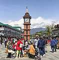 Srinagar: Tourists and locals bask in the sun near the historic Ghanta Ghar after five days of incessant rains which caused flood like situation in the Valley, in Srinagar, Wednesday, May 1, 2024. (PTI Photo)  (PTI05_01_2024_000103B)
