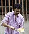 Mumbai: Actor Varun Dhawan cuts a cake during his birthday celebration at his residence, in Mumbai, Wednesday, April 24, 2024. (PTI Photo) (PTI04_24_2024_000270A)
