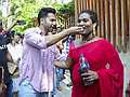 Mumbai: Actor Varun Dhawan feeds cake to a transgender fan during the former's birthday celebration at his residence, in Mumbai, Wednesday, April 24, 2024. (PTI Photo) (PTI04_24_2024_000271B)